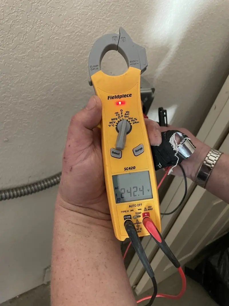 Voltage testing with clamp meter during Hot Tub / Pool Electrical Wiring in Skiatook
